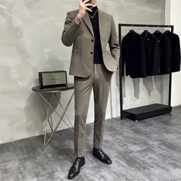 春秋は厚手の手を使うウールカジュアルスーツ メンズセットアップ 韓国風スリムフィット ブリティッシュスタイル カッコいいツーピーススーツ メンズ